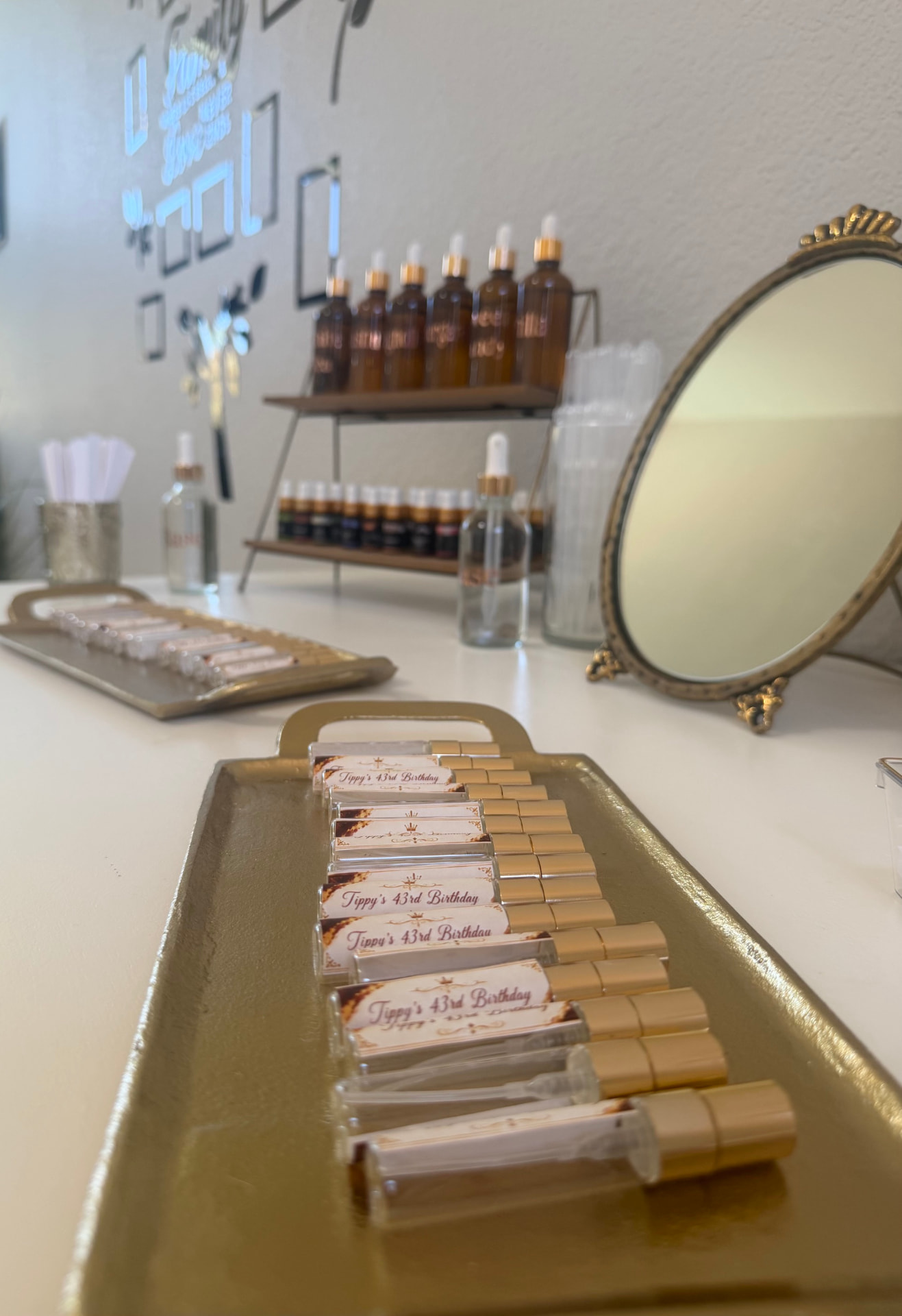 Elegant fragrance bar with custom perfume bottles and gold accents